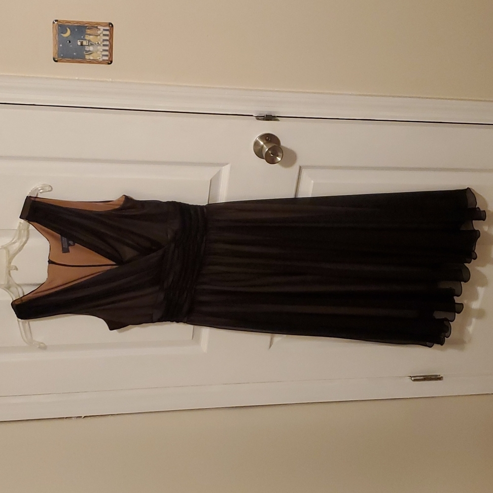 Black dress Dress Barn size 10. The black is sheer with a nude color underneath